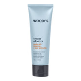 Woody's Cream of Waves hair cream in a light blue squeeze tube with a black cap, shown on a plain white background.
