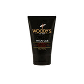 Woody’s Wood Glue Extreme Styling Hair Gel in a sleek black tube with a flip-top cap provides maximum hold for bold, long-lasting styles.