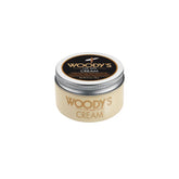 Woody’s Cream for Men Soft Hold Hair Cream in a closed tin offers lightweight, frizz-free styling with a natural, polished finish.