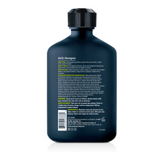 The back of a dark blue bottle of daily shampoo with extensive white and yellow text, photographed on a clean white background.