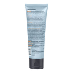 The back of a light blue tube of 'cream of waves' hair product, featuring extensive text instructions and a black cap, shown on a plain white background.