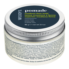 back of Woody's Pomade medium-firm hold hair wax in a round white plastic jar 