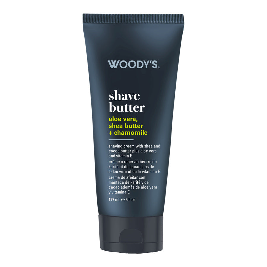 Woody's Shave Butter in a dark navy blue squeeze tube with white and yellow text, shown on a plain white background.