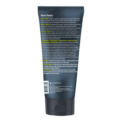 The back of a dark gray squeeze tube of shave butter, showing detailed product instructions and ingredients in white and yellow text, on a solid white background.
