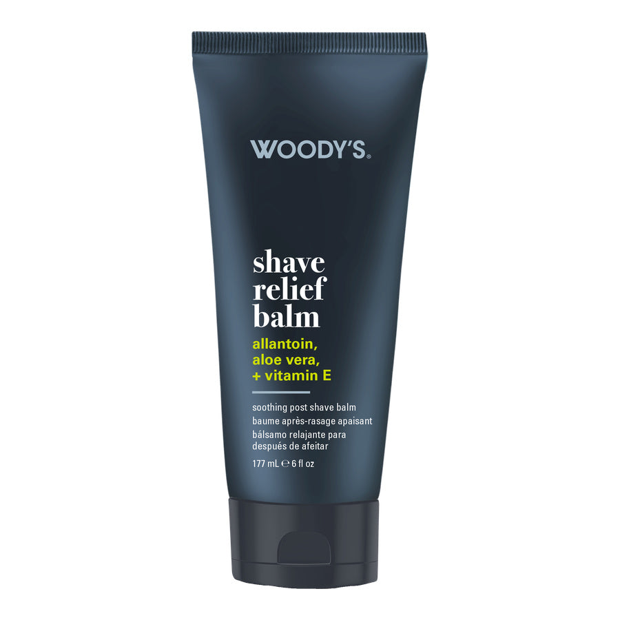 Woody's Shave Relief Balm in a dark navy blue squeeze tube with white and yellow text, shown on a plain white background.