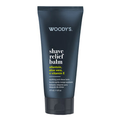 Woody's Shave Relief Balm in a dark navy blue squeeze tube with white and yellow text, shown on a plain white background.