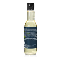 Back of a bottle of beard wash on a white background