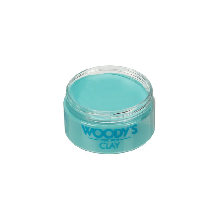 Woody’s Clay for Men Lightweight Matte Clay in an open tin without lid enhances texture and volume while keeping styles soft.