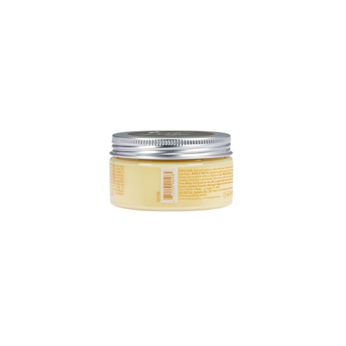 Woody’s Matte Styling Cream in a side-view tin highlights sleek packaging with firm hold and texture-enhancing details.