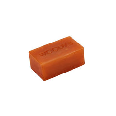 Woody’s Hair & Body Shampoo Bar Angled with embossed branding, ideal for an all-in-one refreshing and cleansing experience.