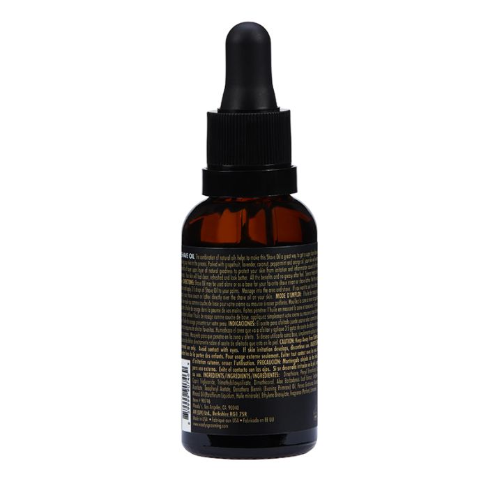 Woody's for Men Shave Oil (Back) displays product details, ingredients, and benefits for pre-shave skin prep.