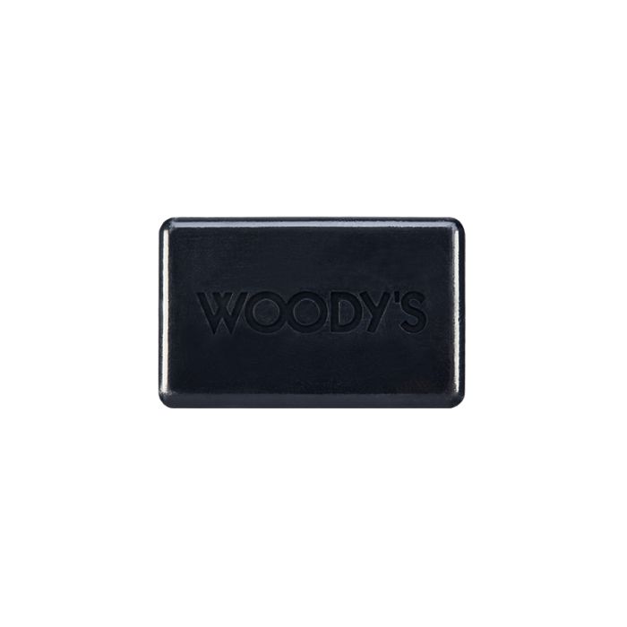 Woody's for Men Activated Charcoal Bar Soap (Front) embossed logo on a cleansing bar for skin detox and hydration.